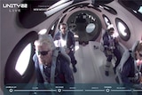Billionaire Richard Branson and crew are seen on board Virgin Galactic's passenger rocket plane VSS Unity
