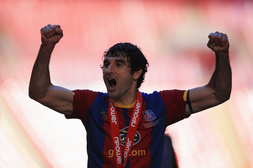 Crystal Palace captain Mile Jedinak celebrates at Wembley