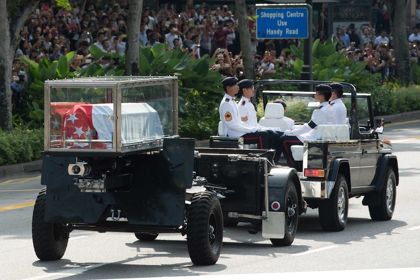 Singapore's former prime minister Lee Kuan Yew is transferred atop a gun carriage