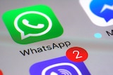 WhatsApp communications app appears on a smartphone next to Viper and Messanger.