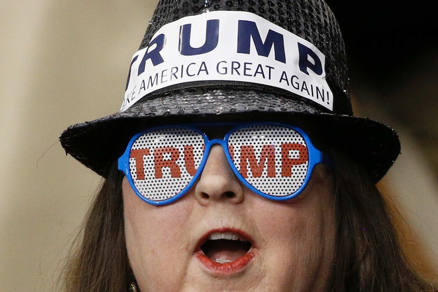 A supporter of Donald Trump attends a Trump campaign rally.