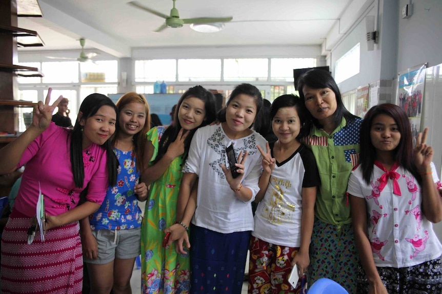 Women smiling in a group photo