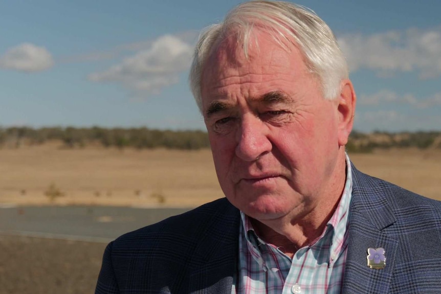 Man talks about solar energy for Toowoomba region in front of farms