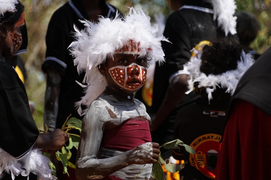 An aboriginal child in traditional dress