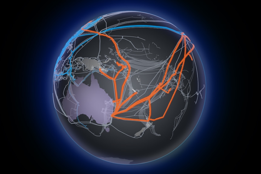  A vector illustration of blue, red and grey lines laid over spherical glowing 3D world map on plain black background.