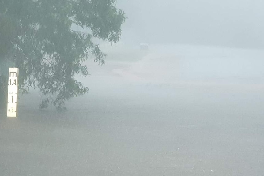 A flooded street at Wagait Beach.