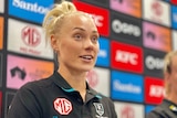 AFLW player Erin Phillips at a media conference.