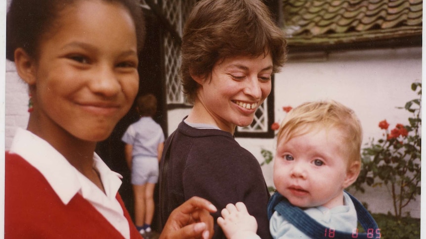 1980s photo of Olivia Humphreys as a baby, and her mother, with another woman standing to their left.