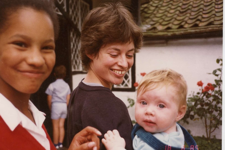 1980s photo of Olivia Humphreys as a baby, and her mother, with another woman standing to their left.