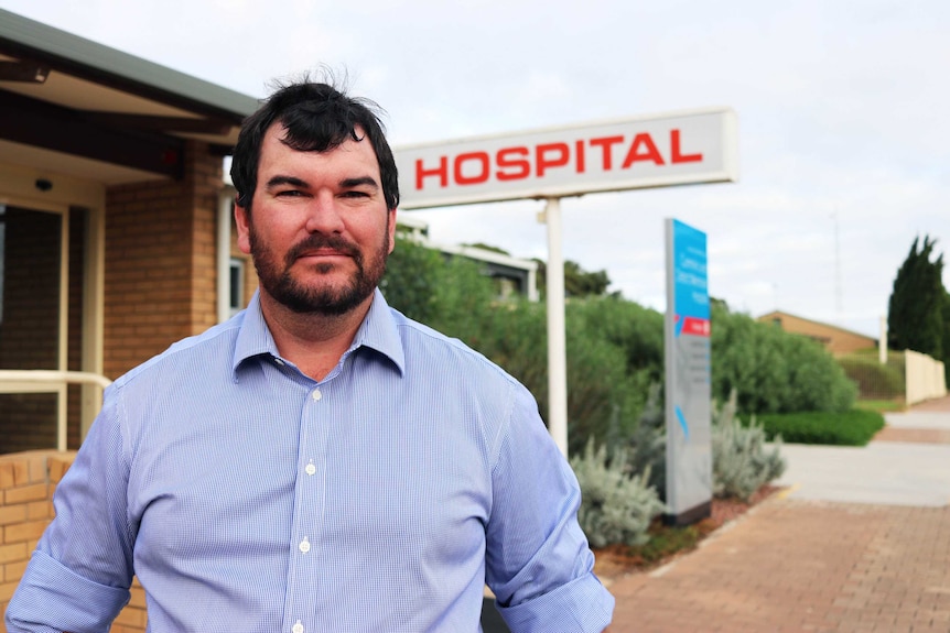 EPLGA President Sam Telfer in front of the Cummins Hospital.