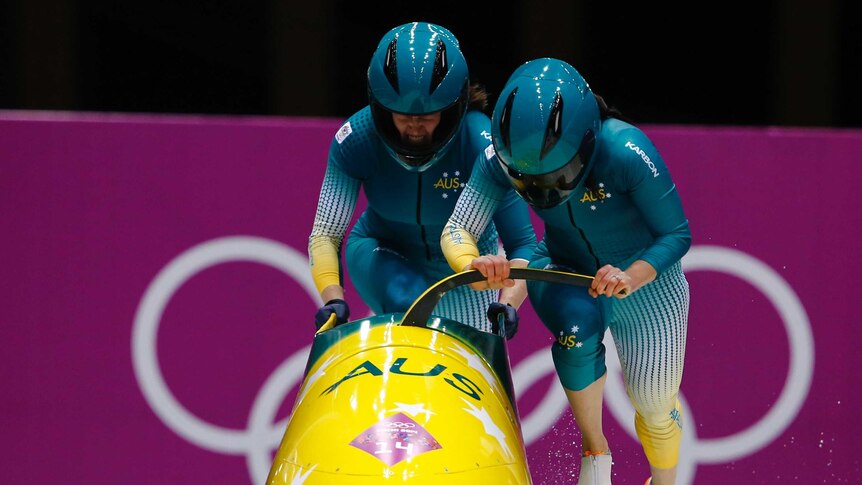 Jana Pittman and Astrid Radjenovic compete in the bobsleigh