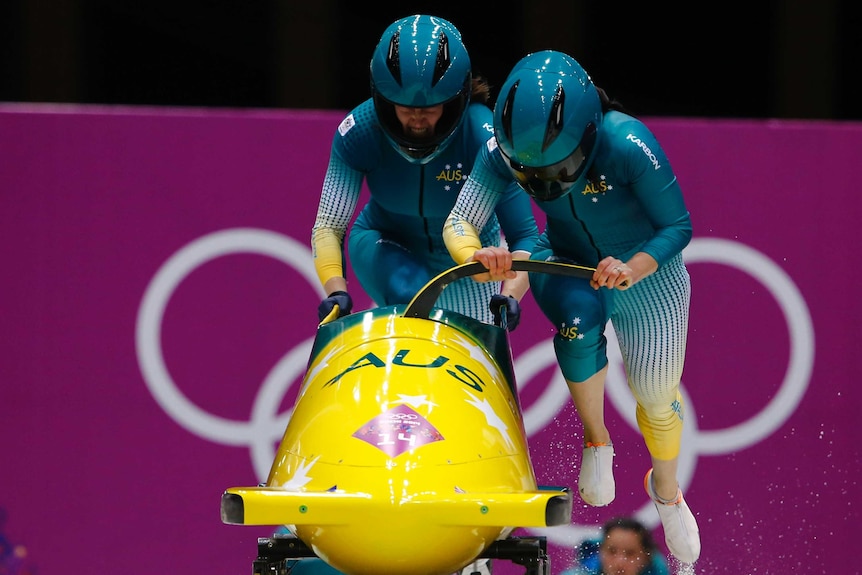 Jana Pittman and Astrid Radjenovic compete in the bobsleigh