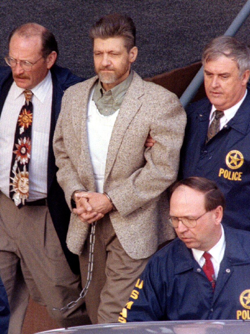 Ted Kaczynski is led from a courthouse