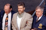 Ted Kaczynski is led from a courthouse
