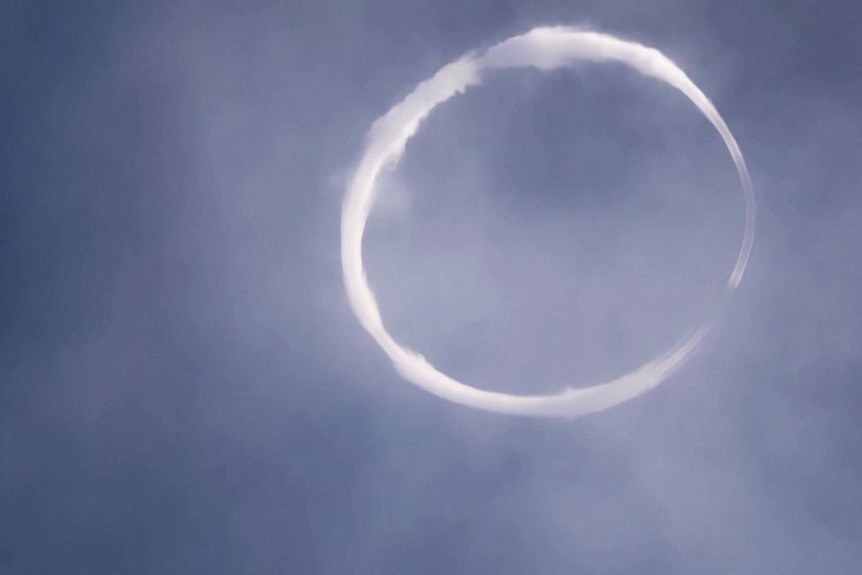 A ring of whispy cloud making a complete circle.