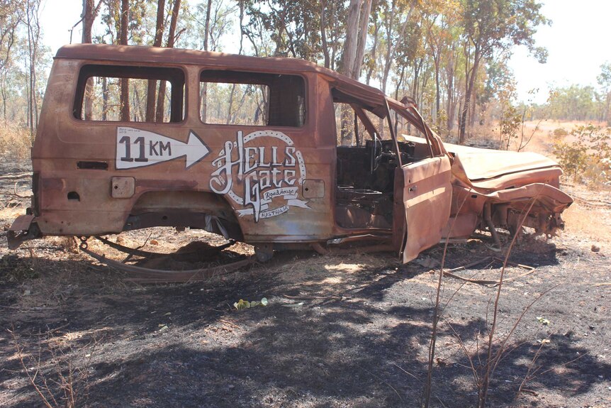 Burnt out car near Hell's Gate roadhouse