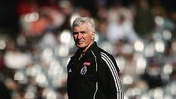 Mick Malthouse watches his side warm up before their clash with Fremantle