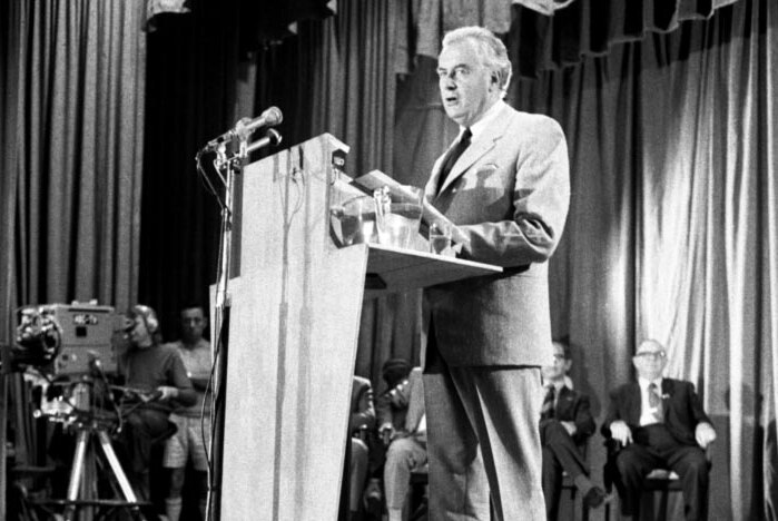 Gough Whitlam stands at Its Time podium