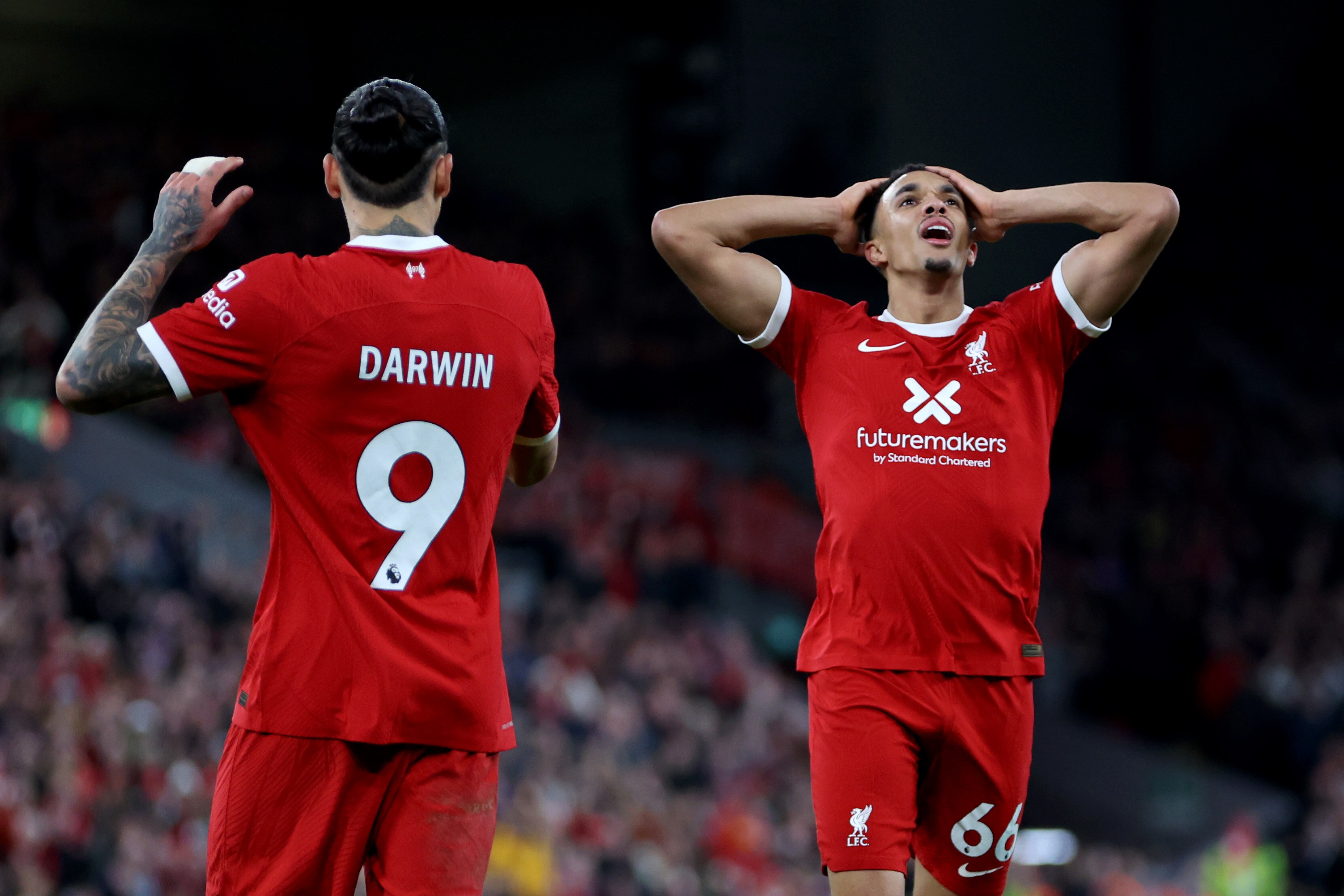 Trent Alexander-Arnold holds his head