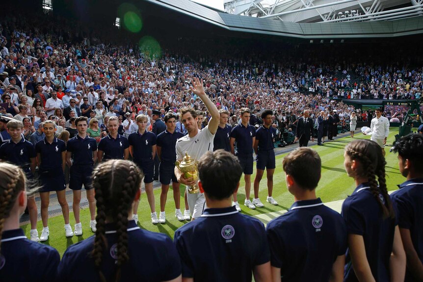 Andy Murray celebrates winning the men's singles final against Milos Raonic at Wimbledon in 2016.
