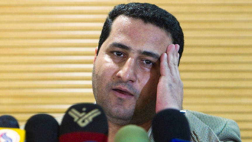 Shahram Amiri at a press conference