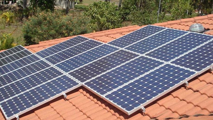 Solar panels on a terracotta tile roof