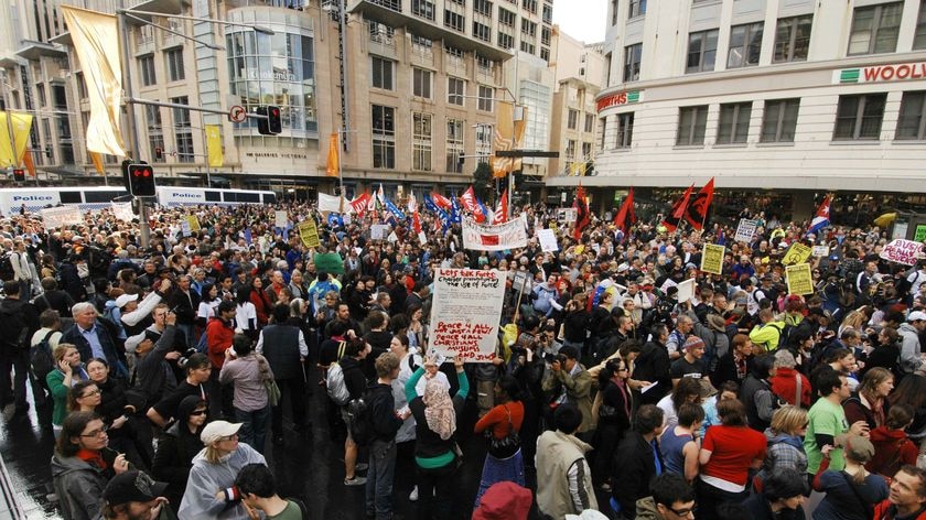 Show of dissent: Thousands of anti-APEC protesters gather at the Town Hall in Sydney
