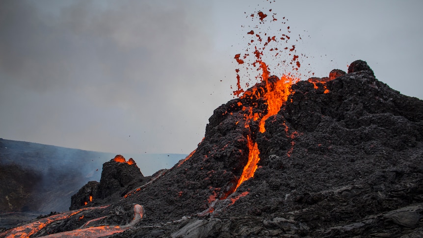 Lava spews from a volcano.