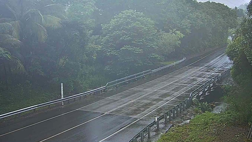 Rainy mist at Currunda Creek Bridge near Cairns