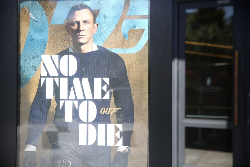 A poster of Daniel Craig as James Bond.