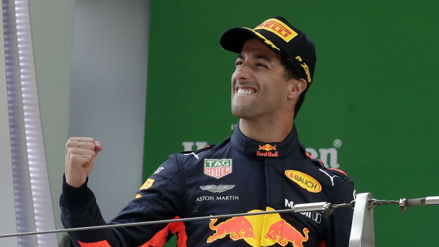 Daniel Ricciardo celebrates winning F1 race