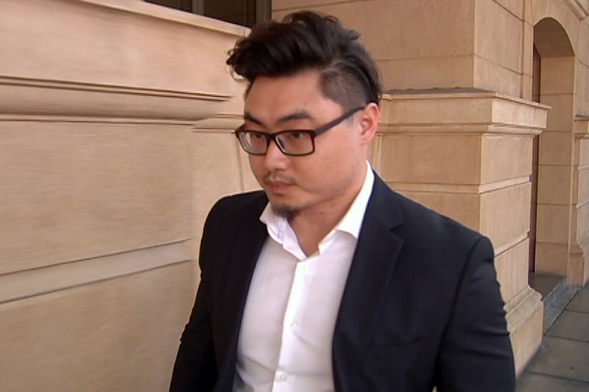 Bo Xi Li leaves the Adelaide District Court.