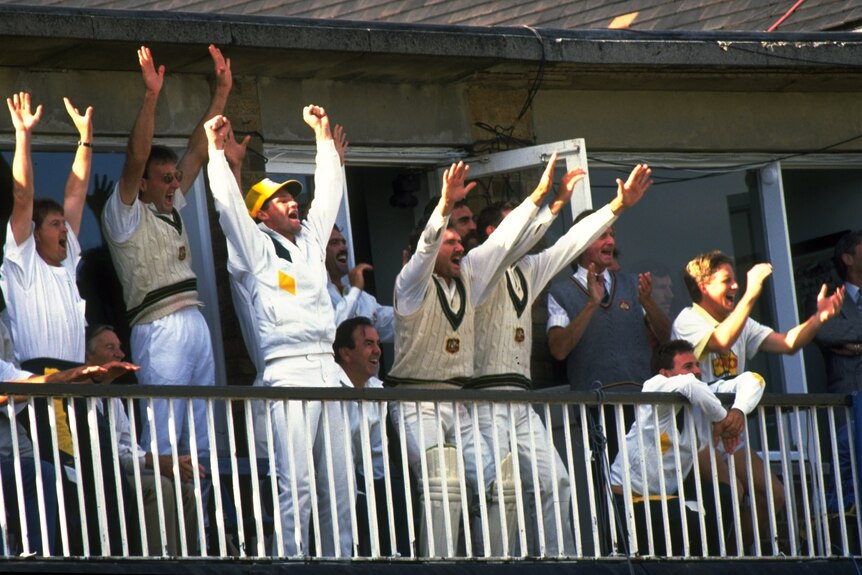 Australian cricketers cheer on the Old Trafford balcony after winning the fourth Ashes Test in 1989.