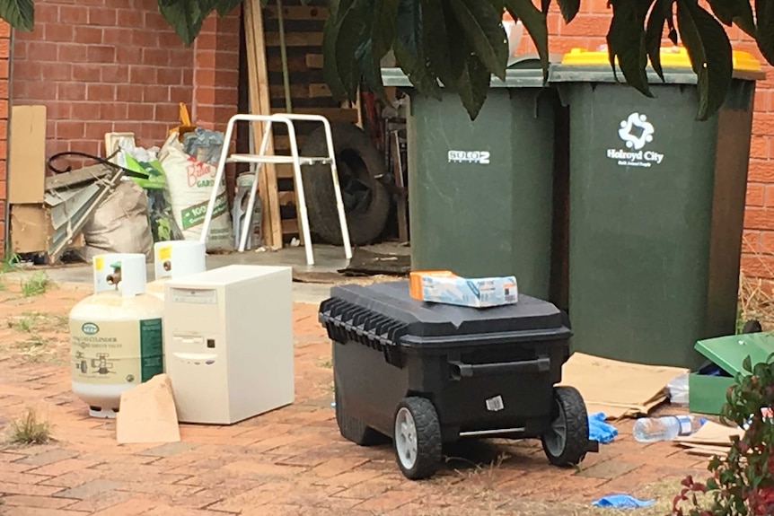 Gas canisters outside Greystanes house