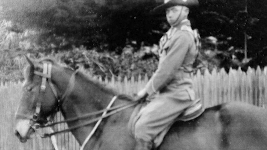 Portrait photo of soldier on horse