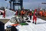 Recovery teams took personal items and debris from flight JT 610 to port of Jakarta.