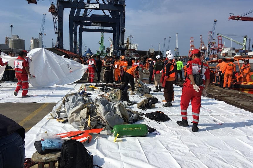 Recovery teams took personal items and debris from flight JT 610 to port of Jakarta.