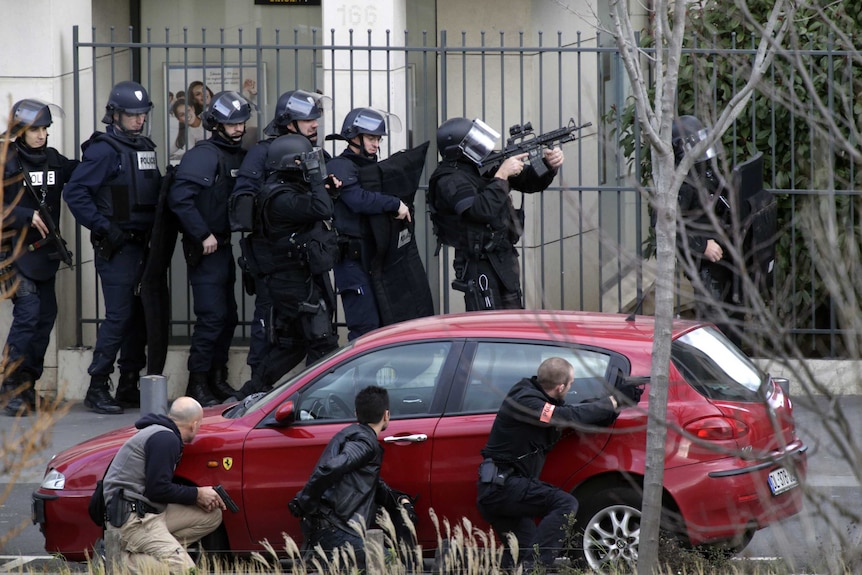 Police respond to a hostage situation in Colombes, outside Paris
