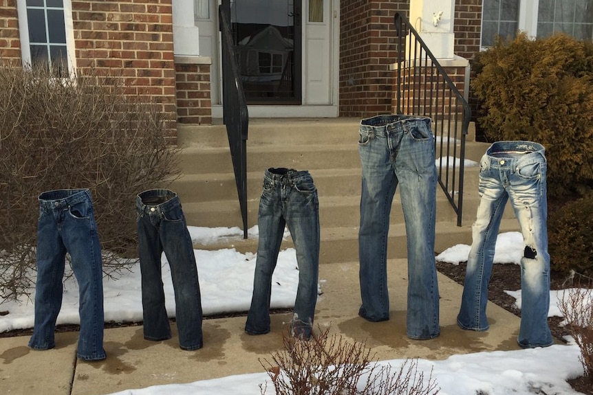 Frozen pants posed to look as if invisible people are wearing them