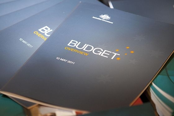 2011 budget papers rest on a table