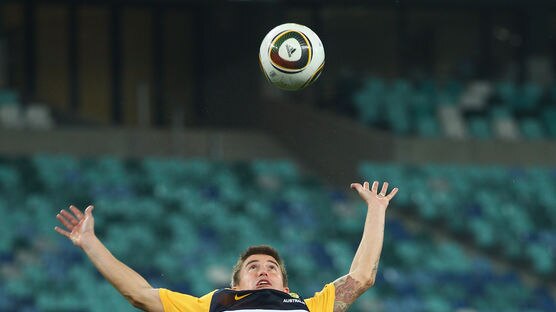 Kewell leaps for ball at training