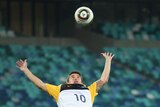 Kewell leaps for ball at training