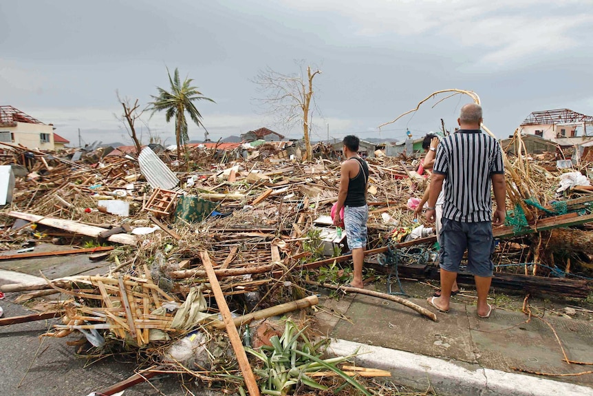 Survivors assess typhoon damage in Philippines