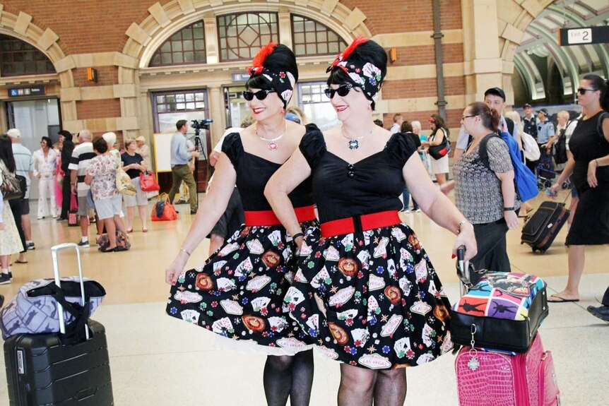 Two ladies dressed in costume.