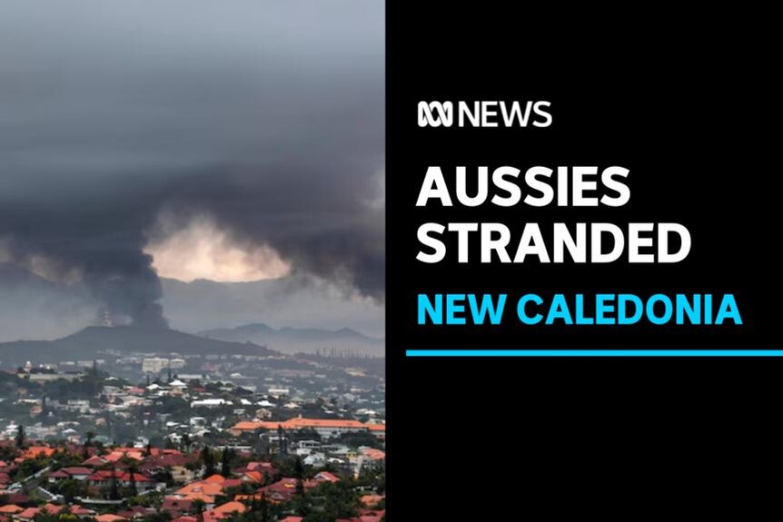 Aussies Stranded, New Caledonia: Plumes of smoke rise over a city