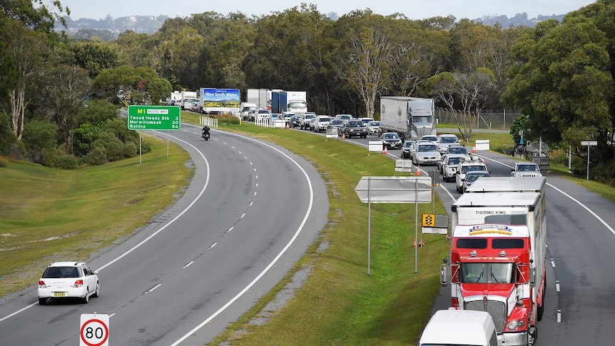 A general view is seen as cars wait to cross the border at Gold Coast Hwy checkpoint on the Gold Coast
