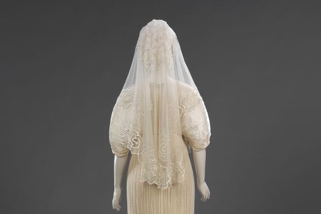 Wedding dress and pleated silk coat