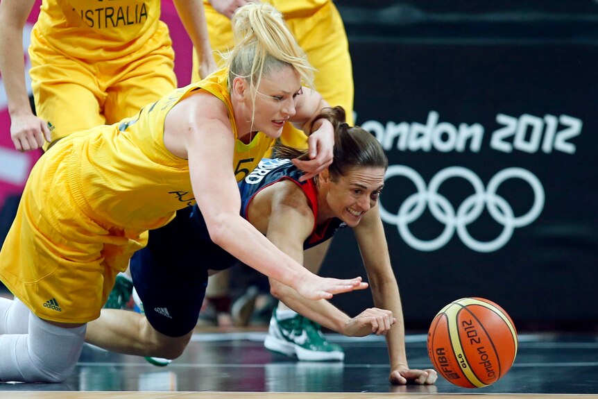 Australia's Lauren Jackson and Great Britain's Natalie Stafford chase a loose ball.