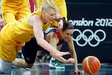 Australia's Lauren Jackson and Great Britain's Natalie Stafford chase a loose ball.