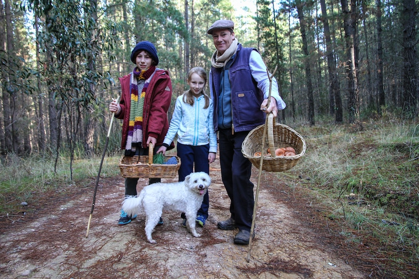 Max with his family, including the pet dog at Moonlight Flat pine plantation in Castlemaine